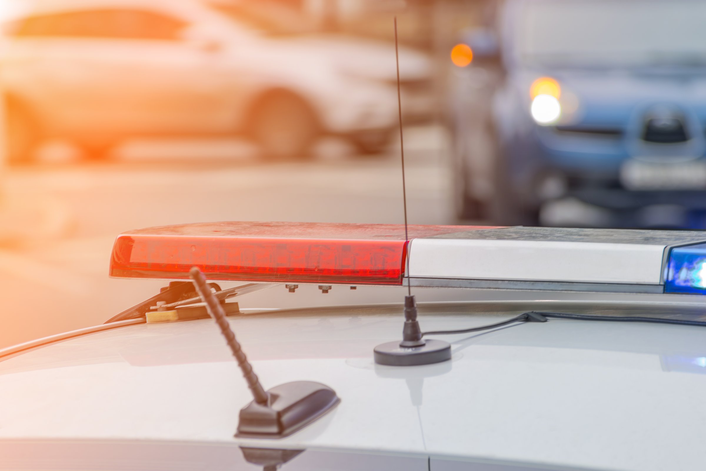 working red blue flashing light on police car. emergency service. close up