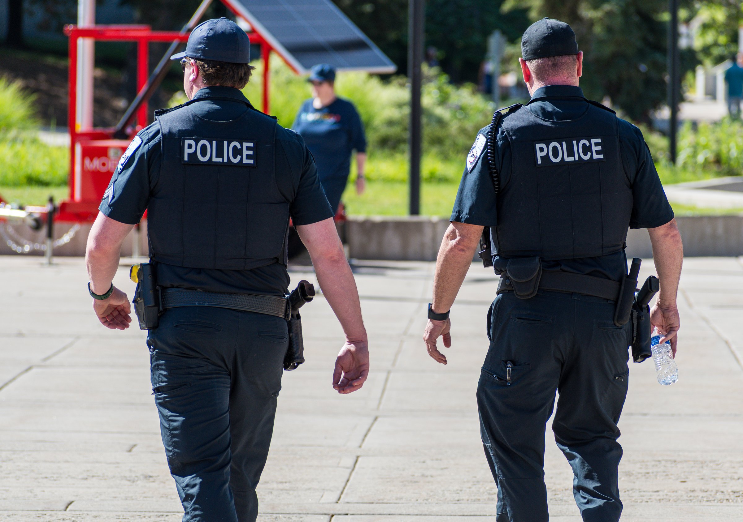Salt Lake City, Utah – June 14: Police officers walk through a city park on June 14, 2025, in Salt Lake City, Utah.