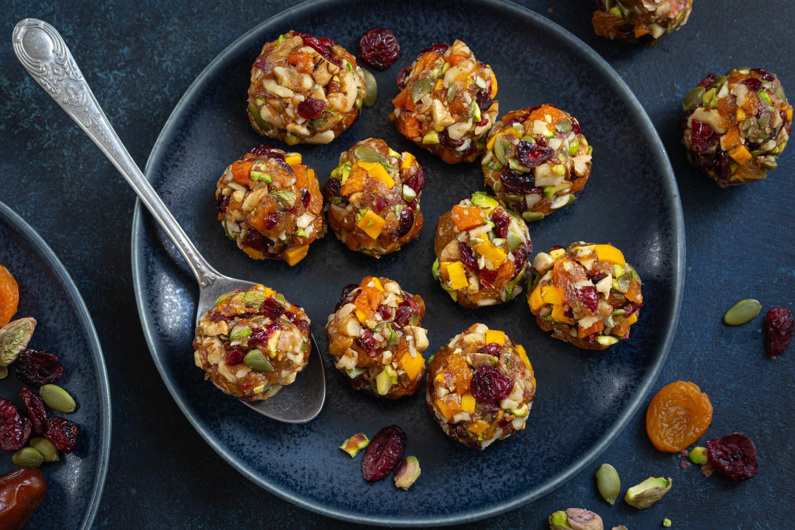 sweet and healthy energy balls,  candied fruits and nuts   bites, delicious natural superfood raw vegan dessert, top view