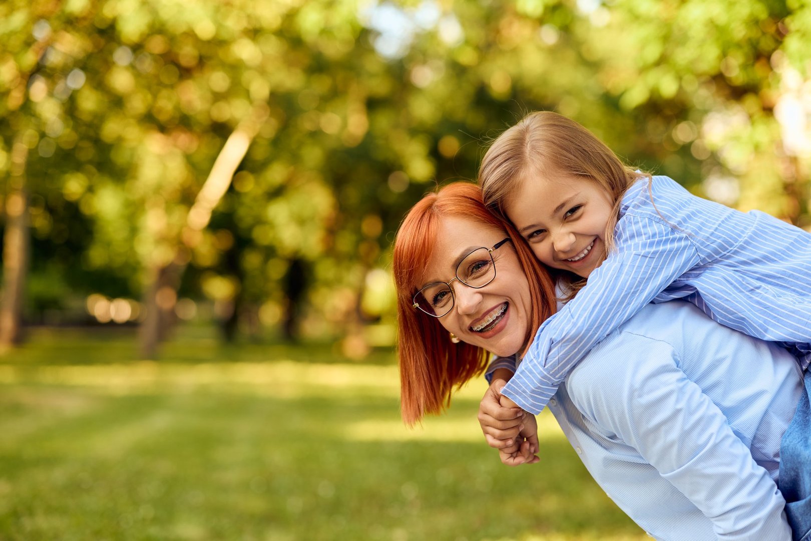 Smiling mother and daughter spending time together