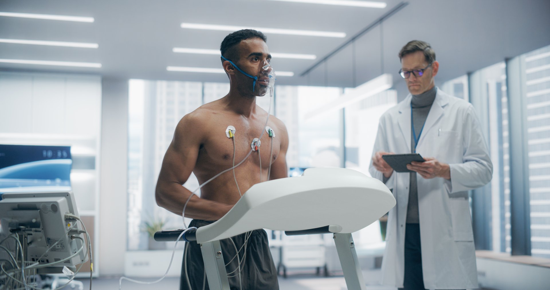 Athlete Wearing Oxygen Mask for a Treadmill Exercise Test in a Laboratory, Monitored by Sensors and Breathing Apparatus, Showcasing Fitness Assessment and Health Monitoring in a Controlled Environment