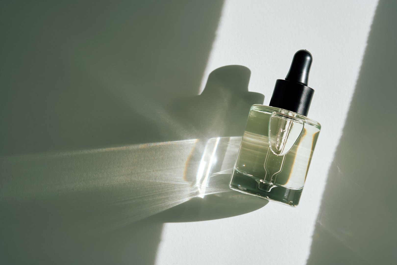 Serum extract for the face with bisabolol and squalane in the sun. High quality photo.