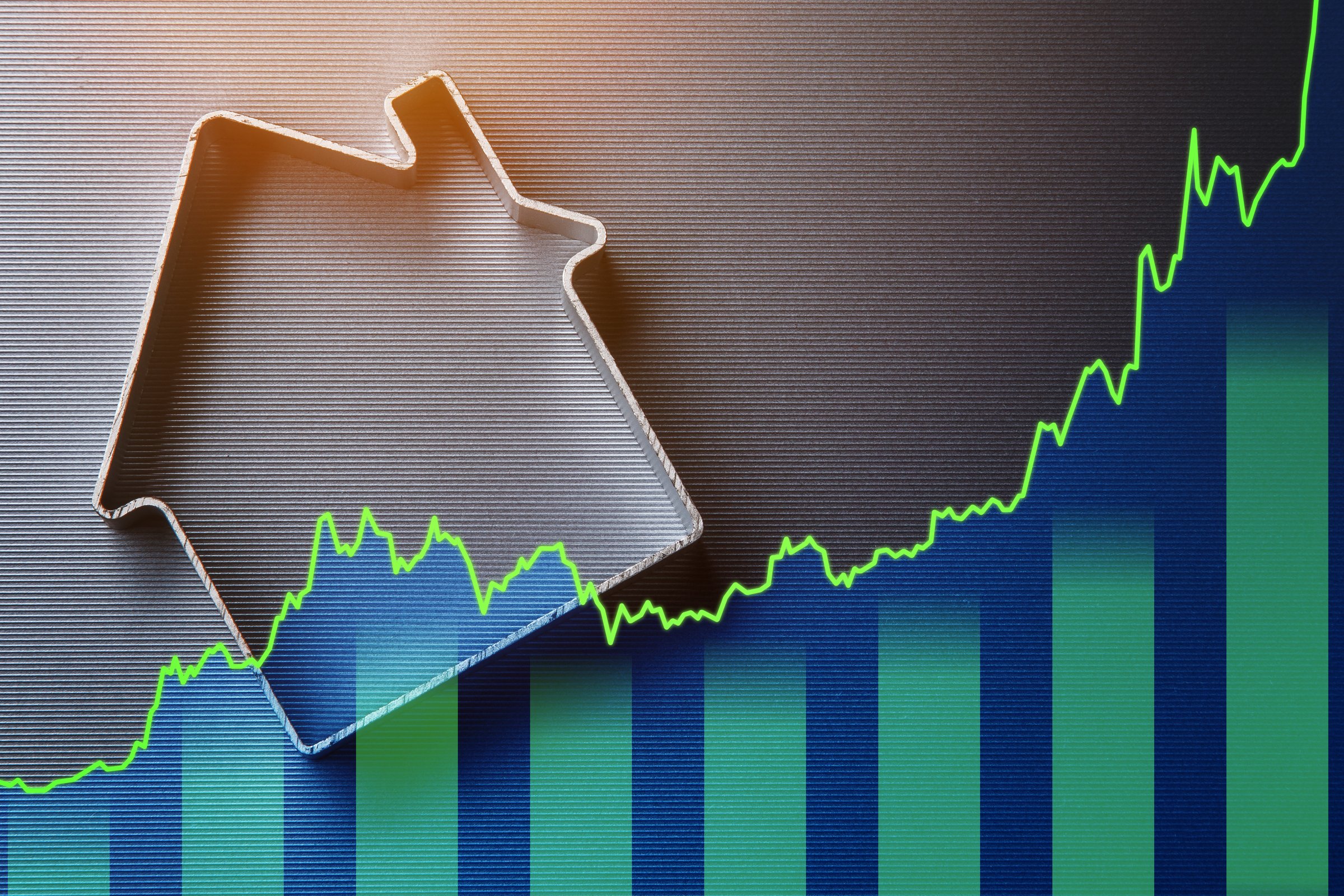 Real Estate Market Growth Concept with Rising Chart and House.
