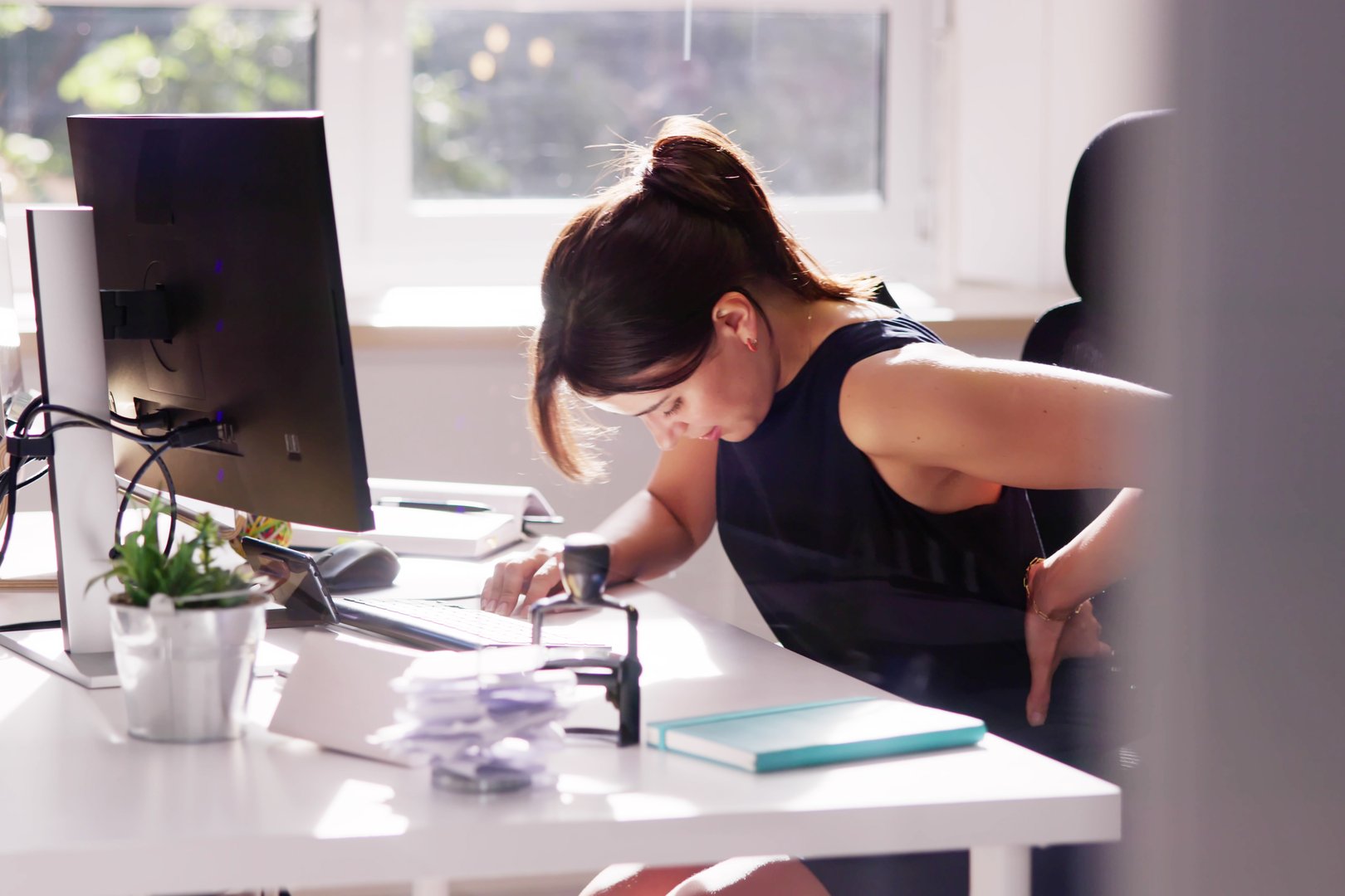 Back Pain Bad Posture Woman Sitting In Office
