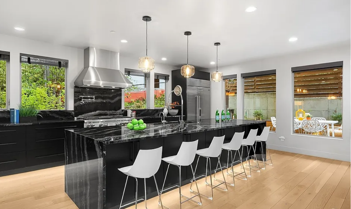 Modern bathroom with illuminated shower niche and custom lighting details