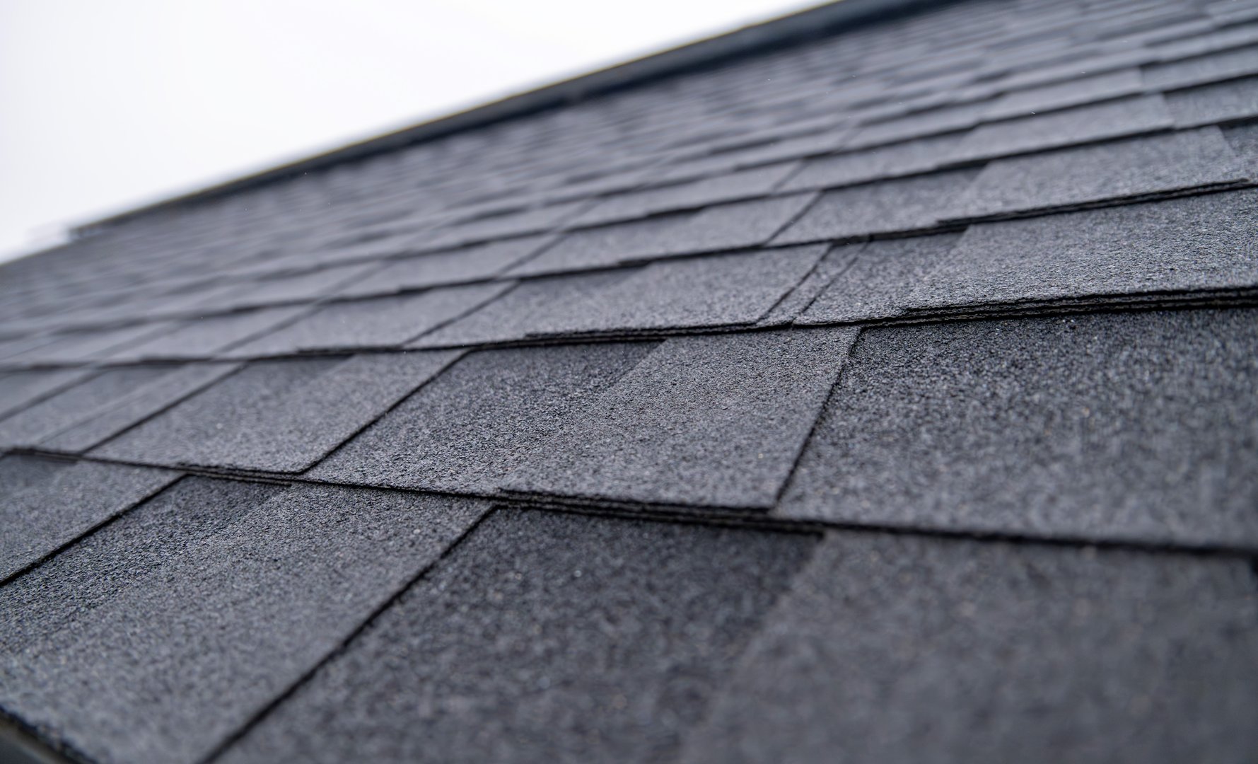 Dark gray asphalt roof shingles texture