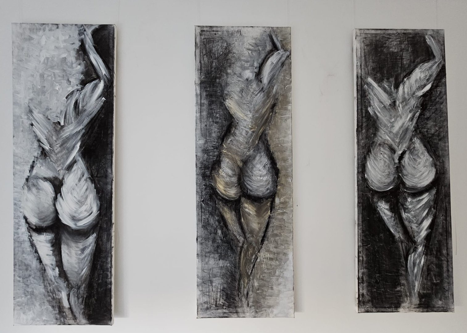 Three abstract paintings of a female figure in grayscale tones, each with a dynamic, textured brushstroke style.