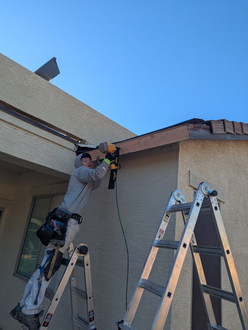 AZ Roofing Dudes team member on roof