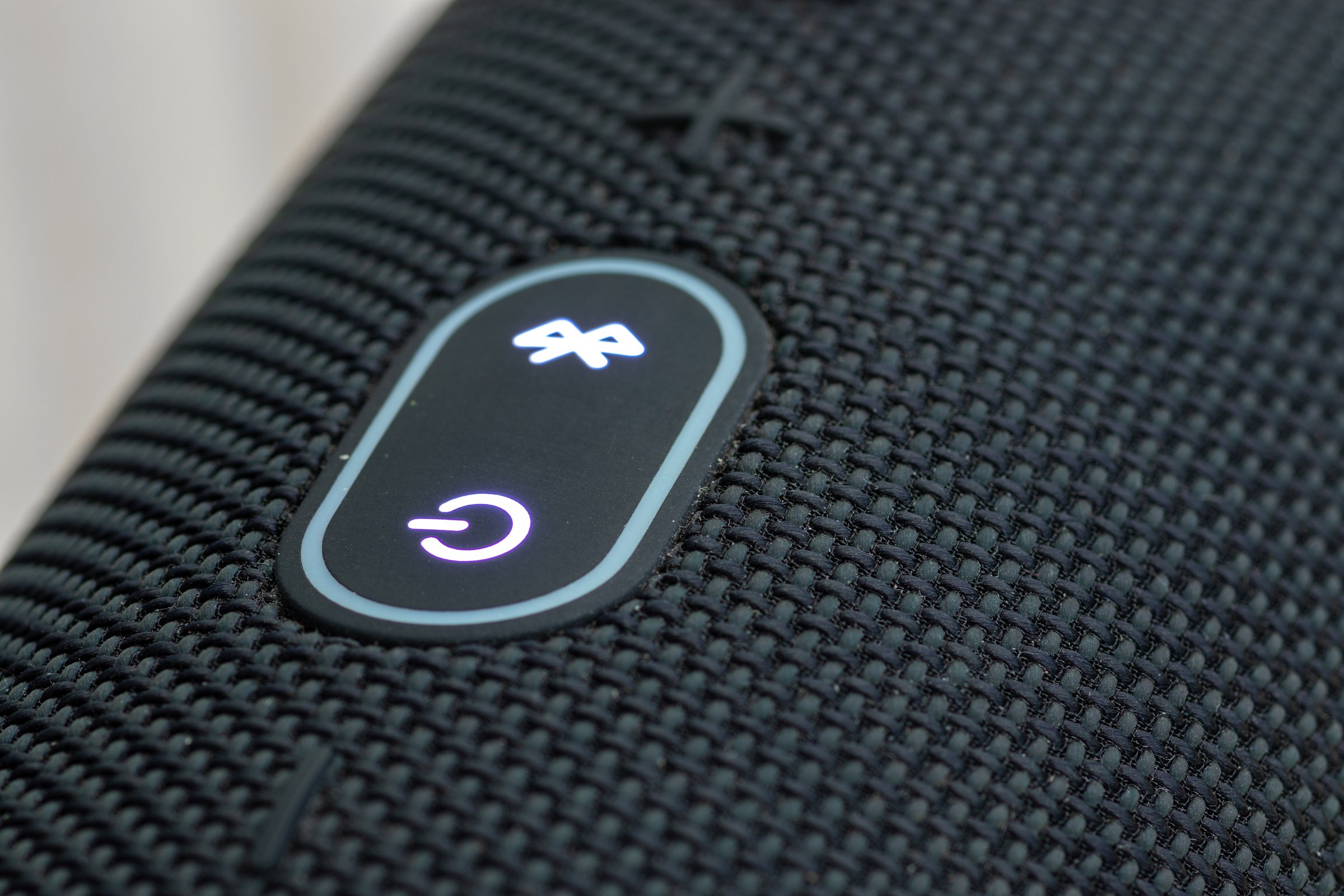 Galle, Sri Lanka - 02 19 2021: On-off and Bluetooth buttons on the portable boom box close up.