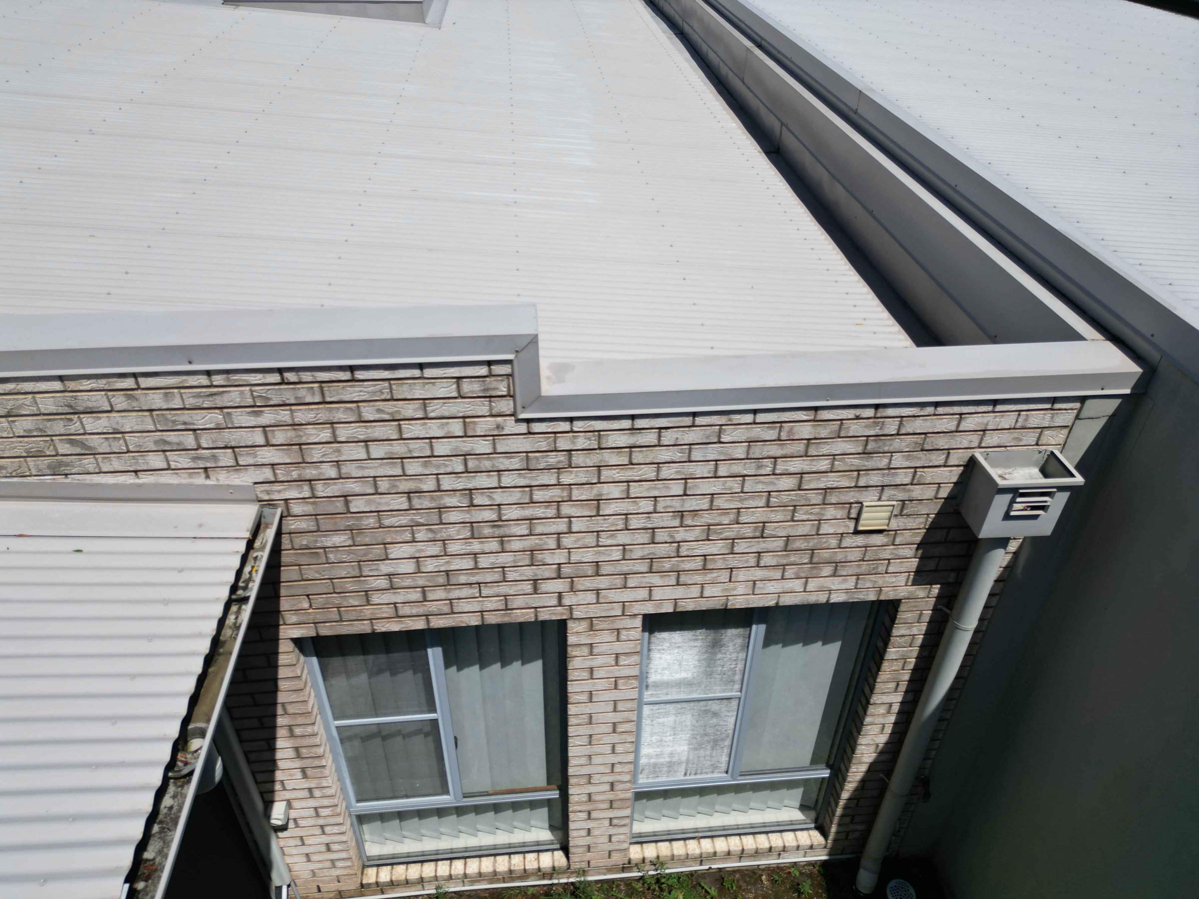 Aerial drone view of cleaned property exterior