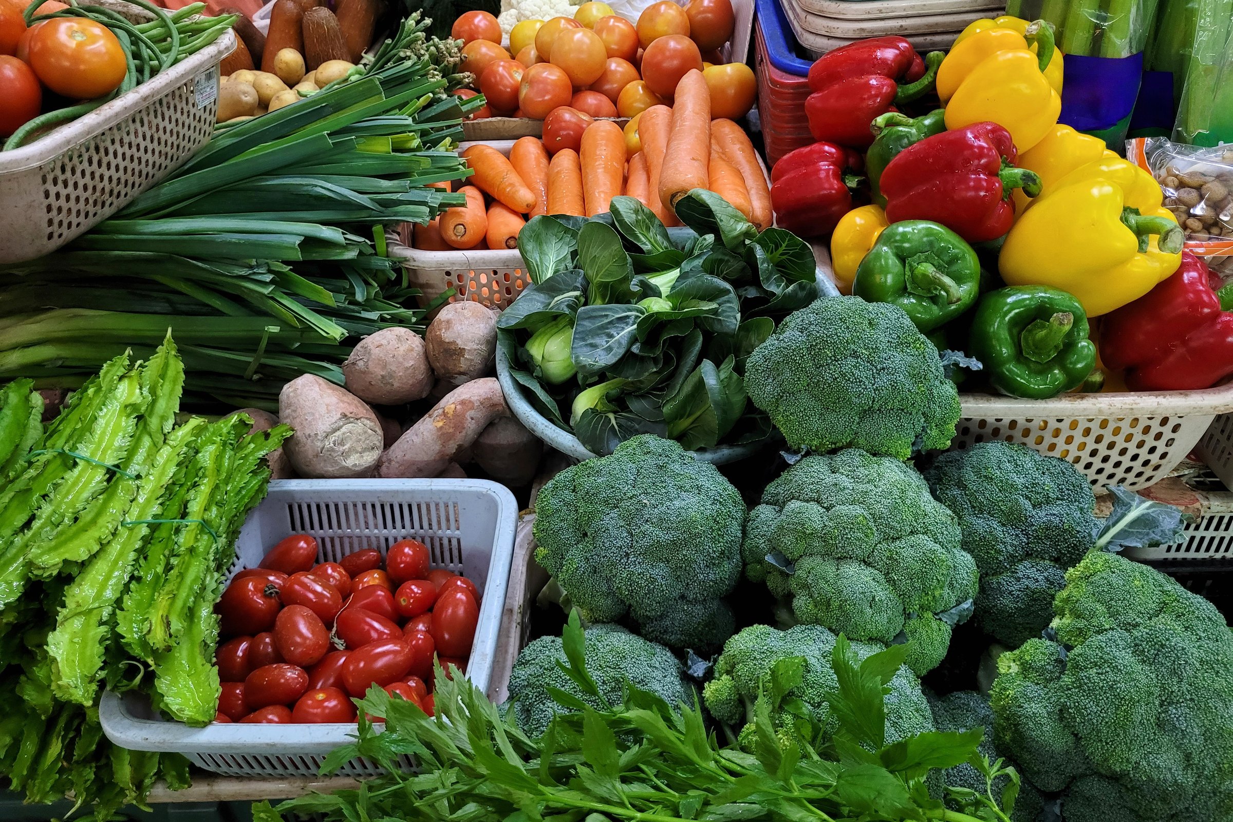 Fresh vegetables and fruits for sale in Asian farmer market stall