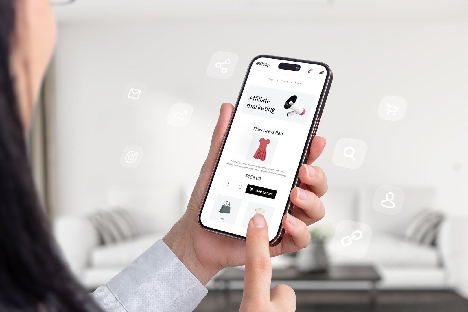 Affiliate marketing composition with a mobile phone in a woman's hands and an ecommerce website offering affiliate marketing links for promotion