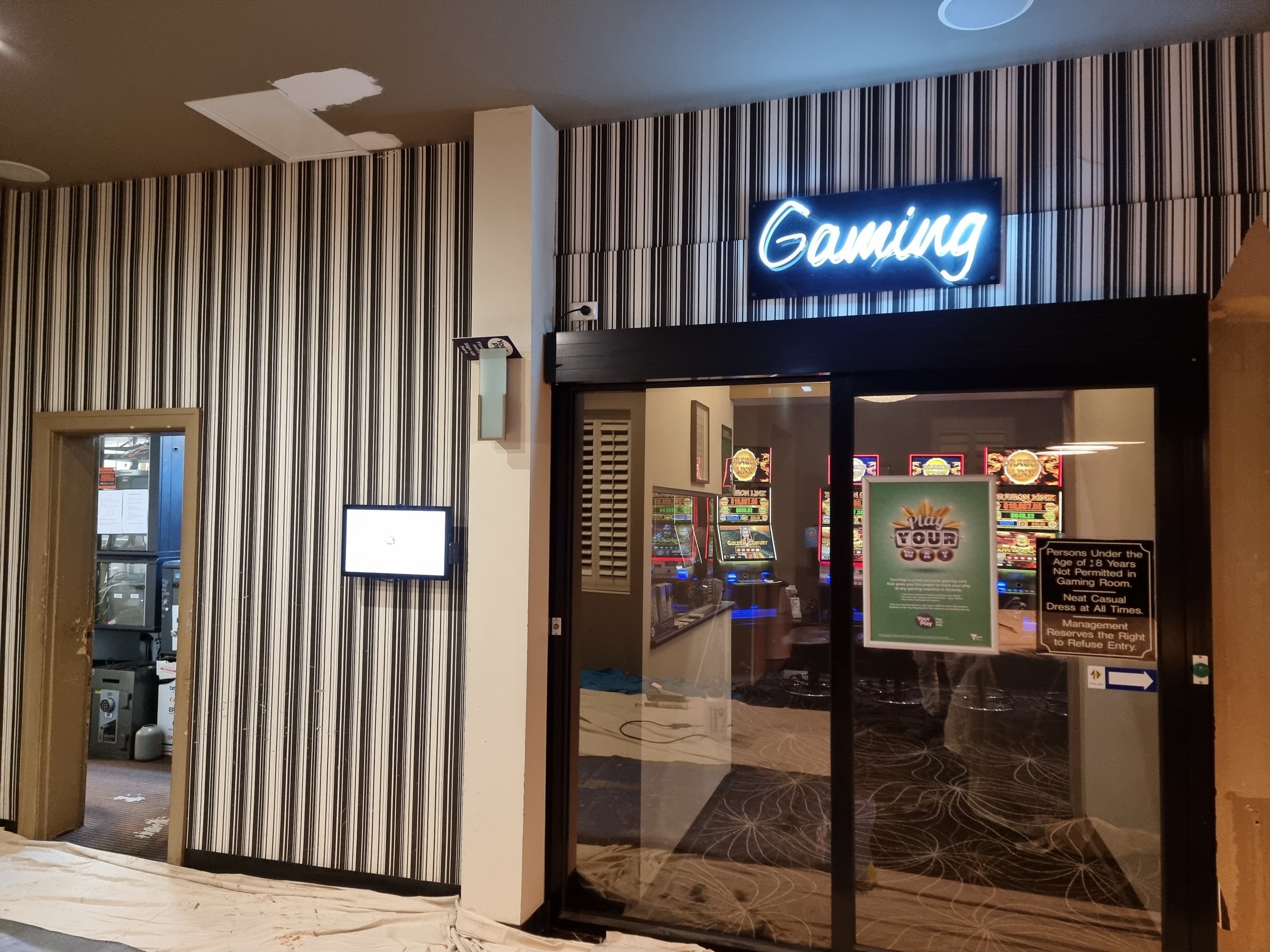 Professional wallpaper removal work in progress at Lorne Hotel project