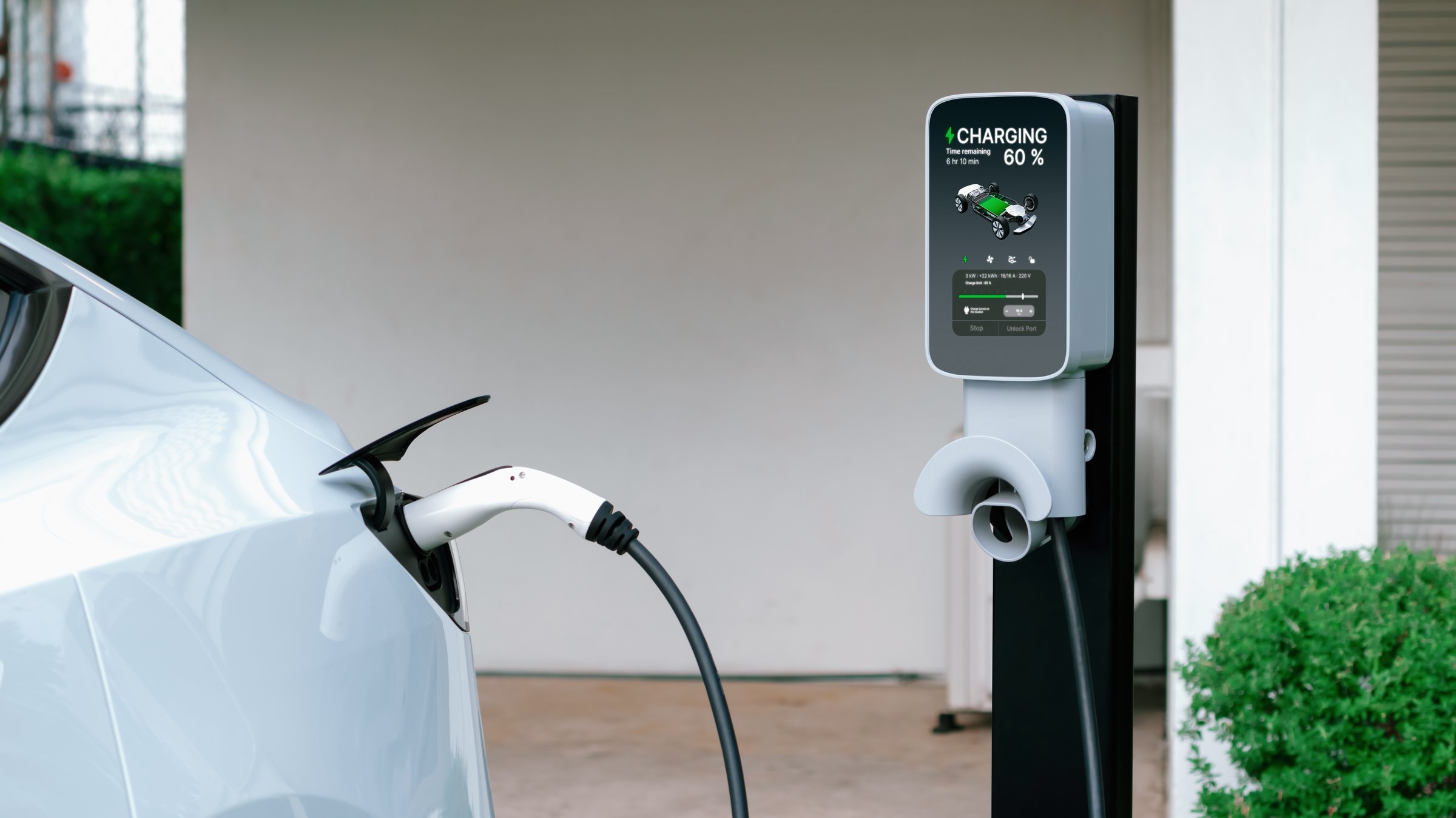 Electric vehicle technology utilized to residential home charging station for EV car battery recharge. Eco-friendly transport by clean and sustainable energy for future environment.Panorama Synchronos