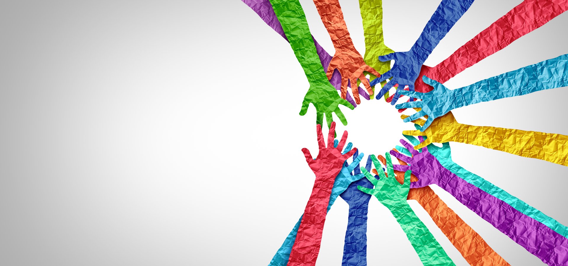 Collaboration And Solidarity as inclusion and multicultural community Unity and teamwork concept as a business metaphor for joining a partnership as diverse hands connected together as a corporate symbol for working cooperation.