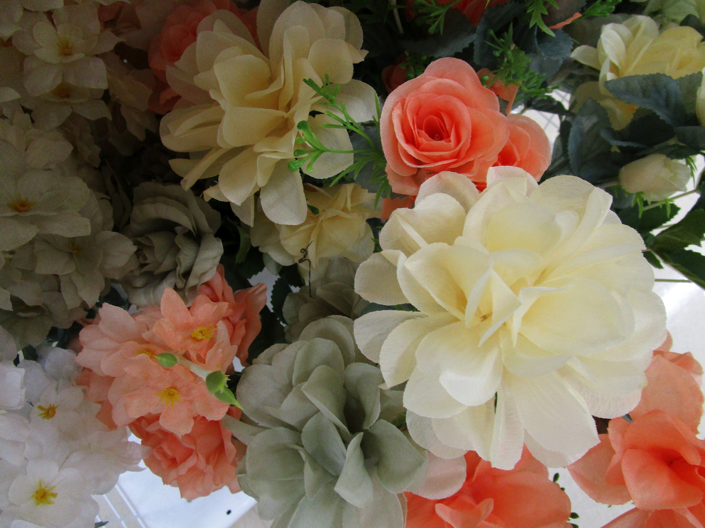 I photographed a bouquet of colorful artificial flowers.
