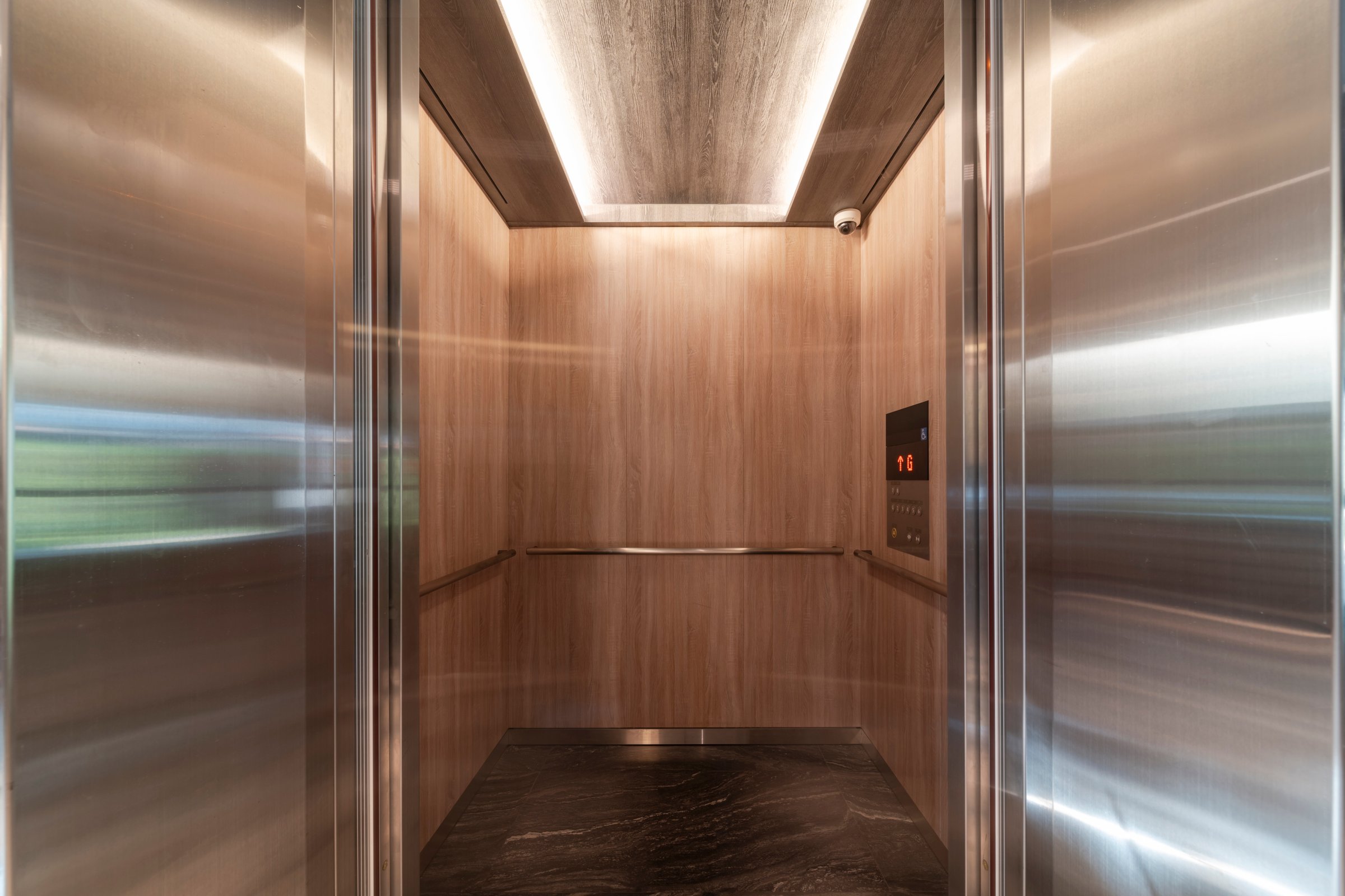 Elevator in the lobby hall of a house. Interior of elevator