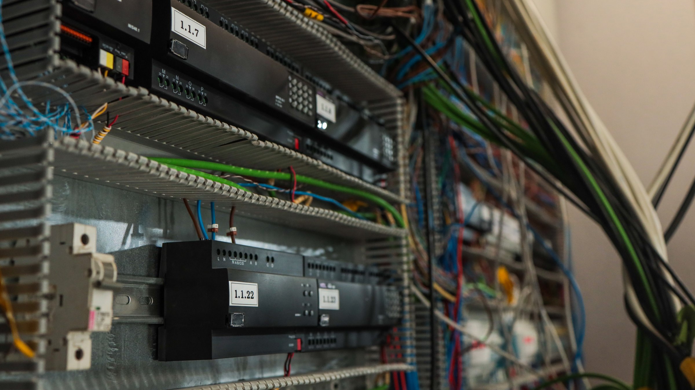 This image showcases the intricate wiring and components within an electrical control panel, highlighting its complexity