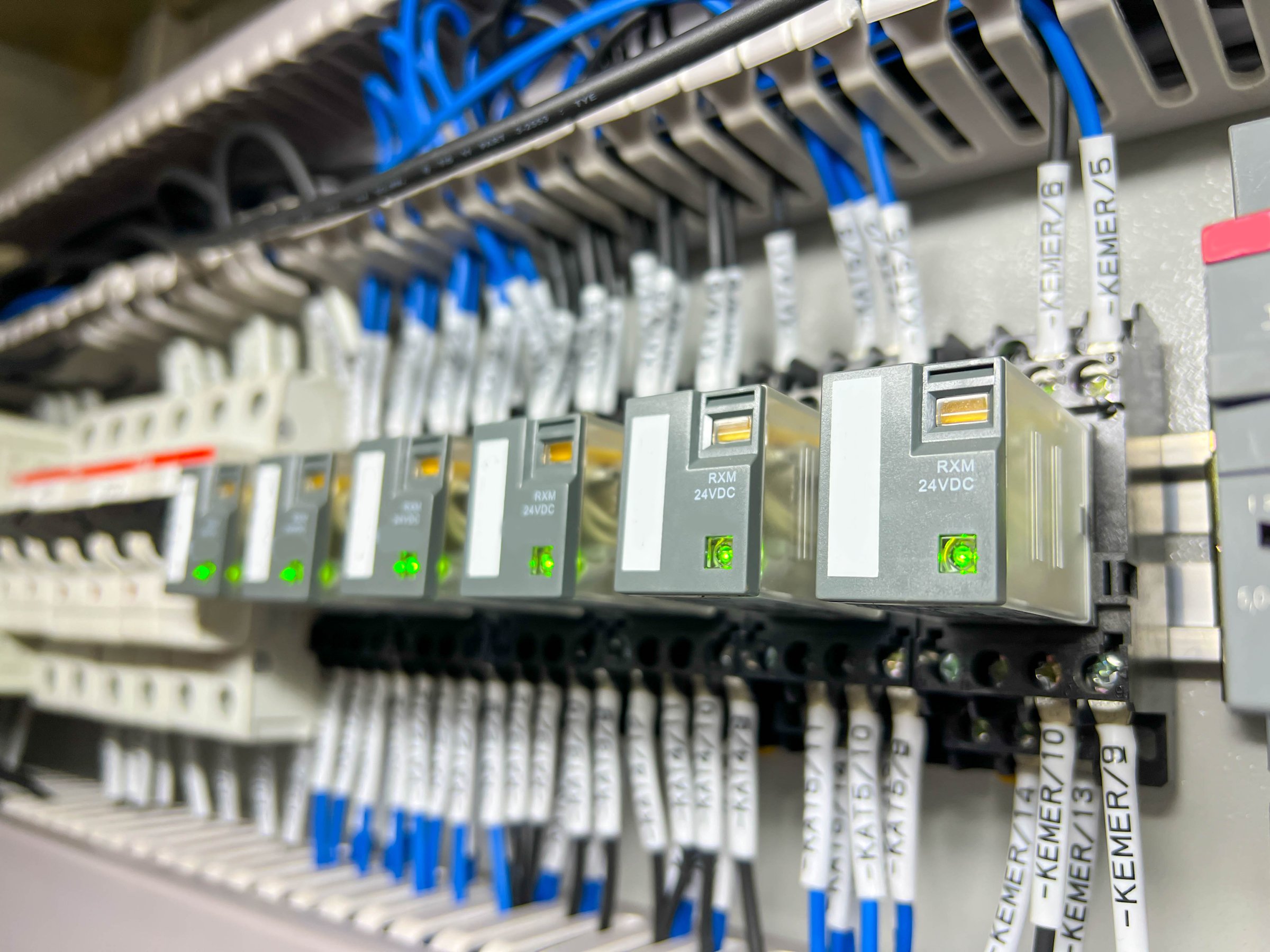 New control panel with circuit-breakers, fuses, rails, low voltage meters, current transformers, relays and other electrical equipment.