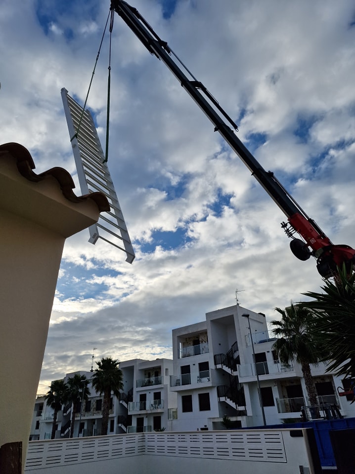Metal staircase with glass panelling