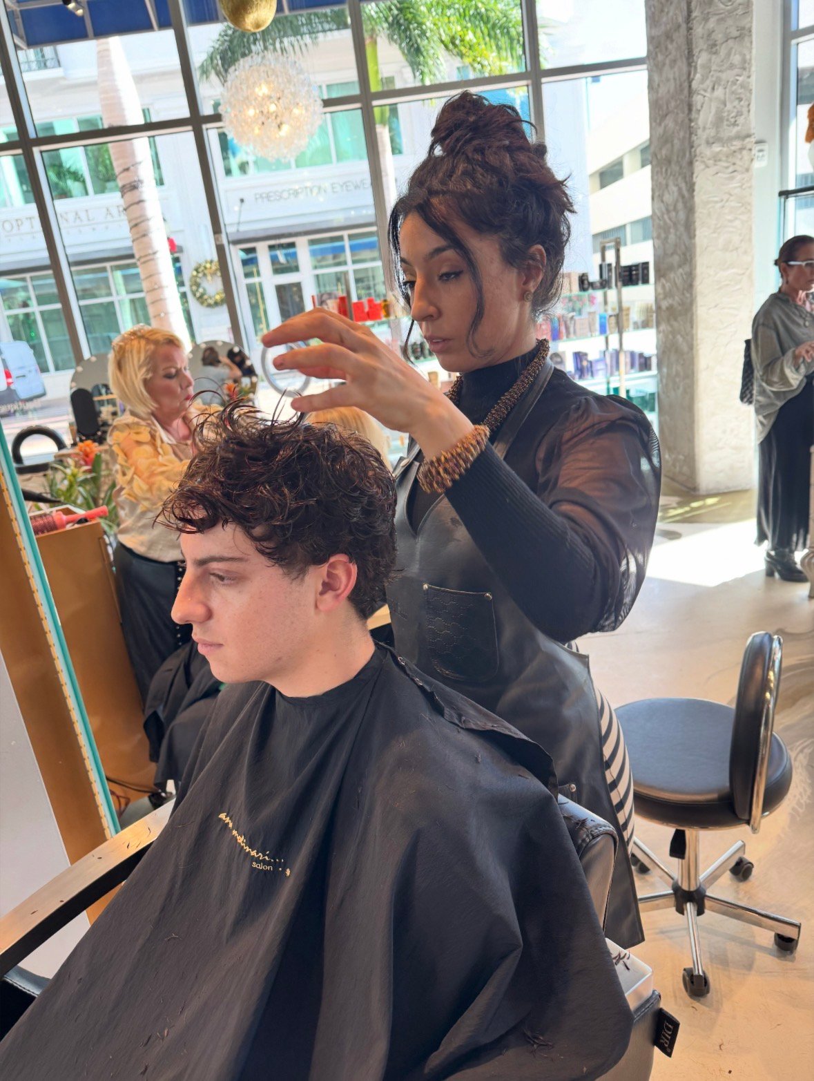 Classic fade with side part at The Q Salon Sarasota