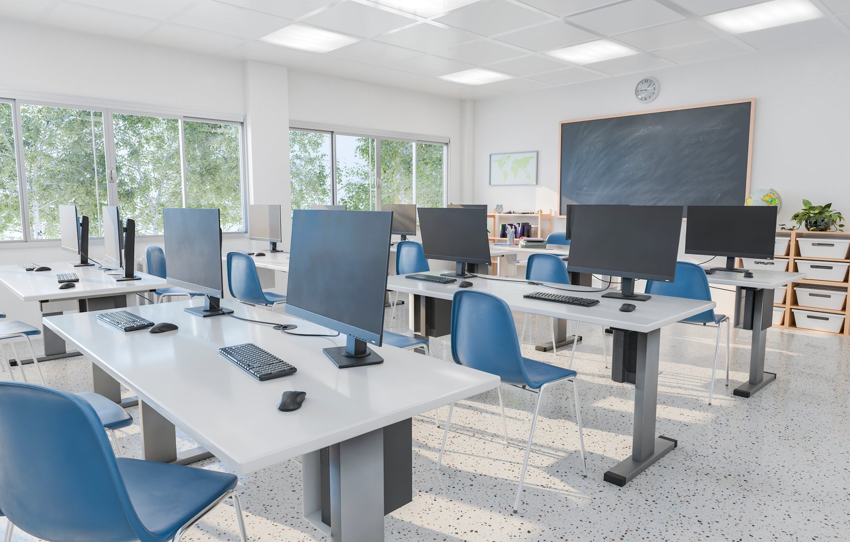 Modern computer classroom featuring multiple monitors on white desks and blue chairs, bright natural light from windows, and a chalkboard at the front. Technology in education concept. 3d rendering