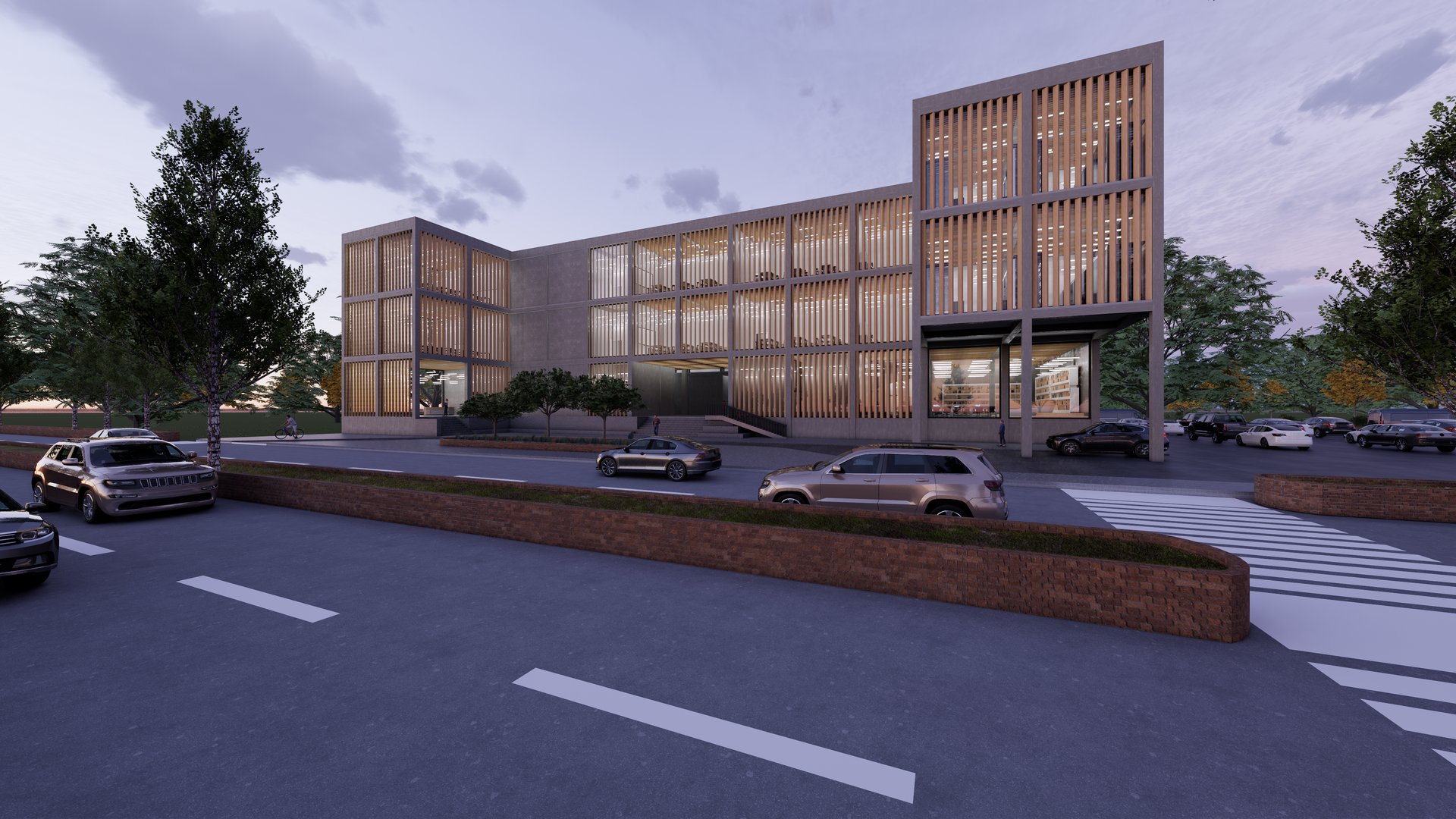 Modern building with large windows and wooden paneling, surrounded by parked cars and trees, with a cloudy sky above.