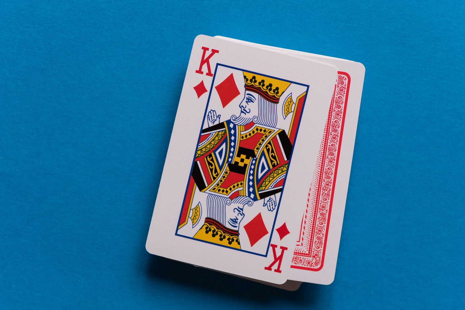 King playing card on a blue background