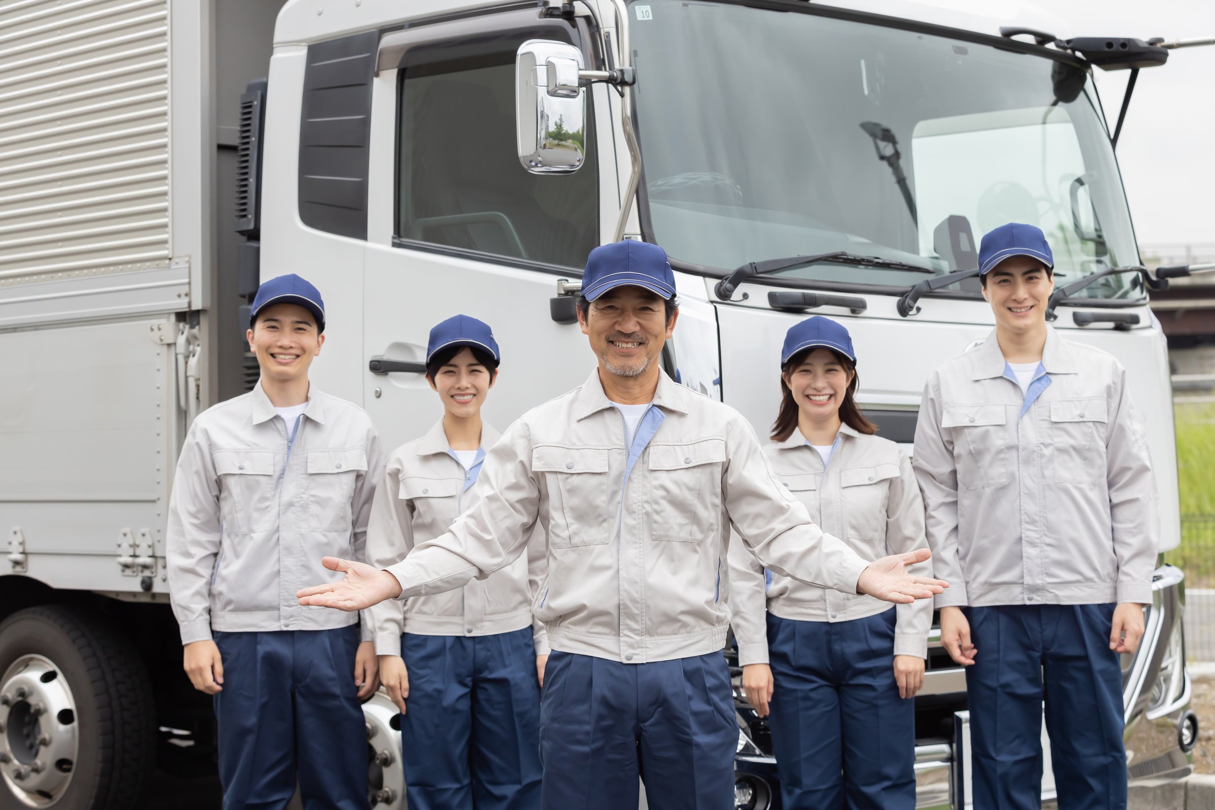 Group of Asian people working in a transportation company