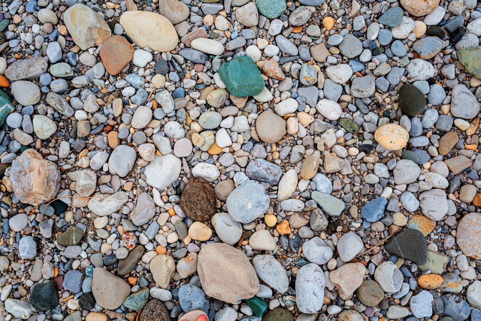 Diverse collection of smooth stones and pebbles