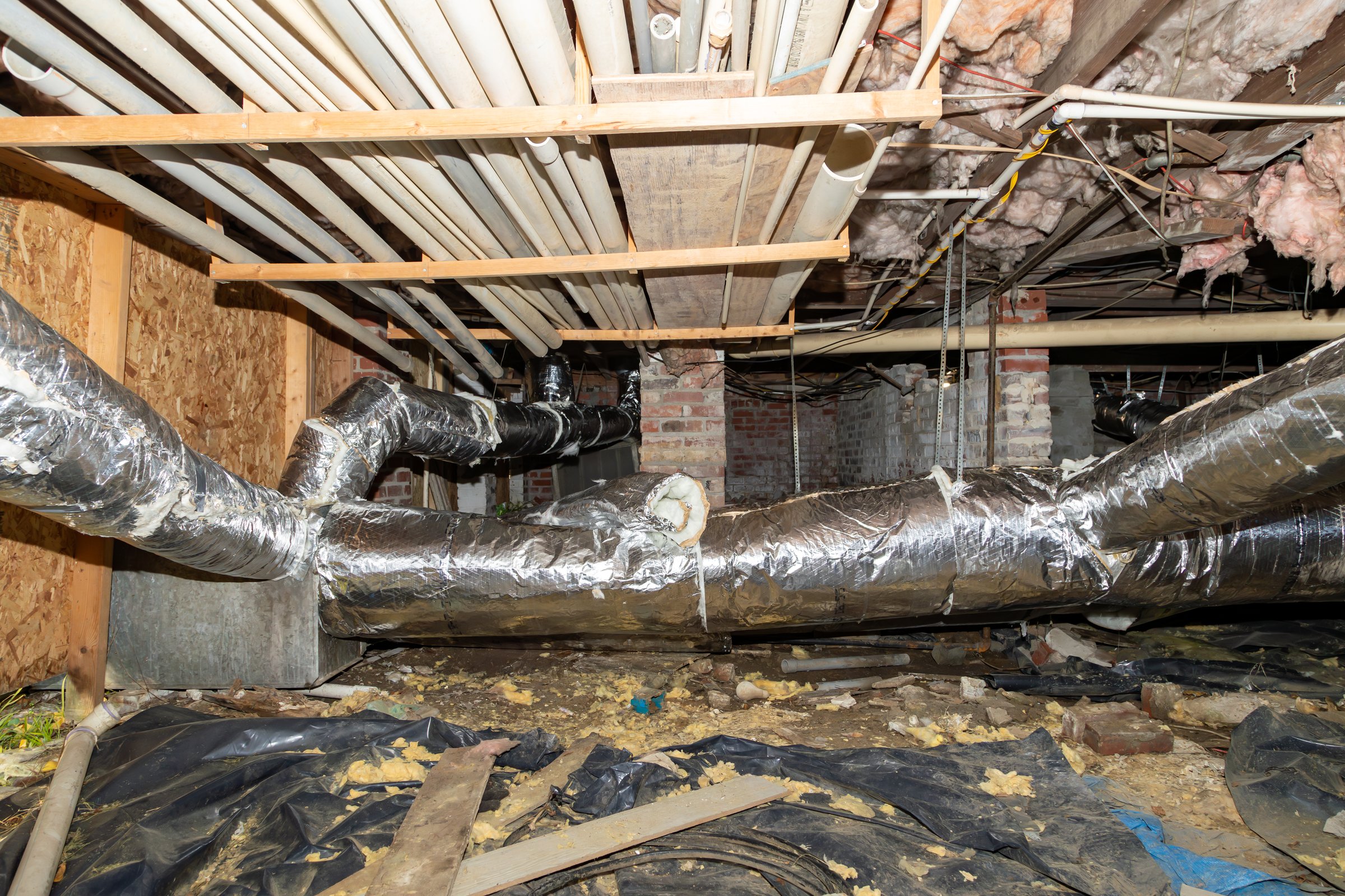 Air conditioner duct work under house in crawl space
