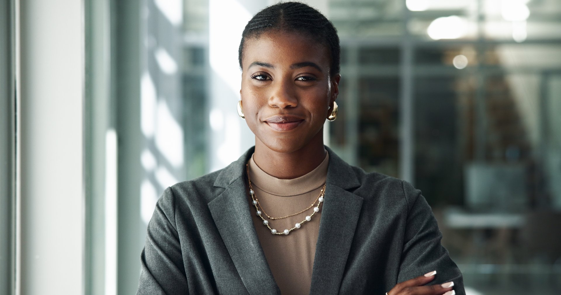 Portrait, smile and lawyer with business black woman in office for advocate, confidence and attorney clerk. Professional, legal counsel and opportunity with employee in law firm for career