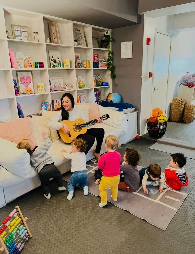Children playing outdoors at Rain or Shine Daycare