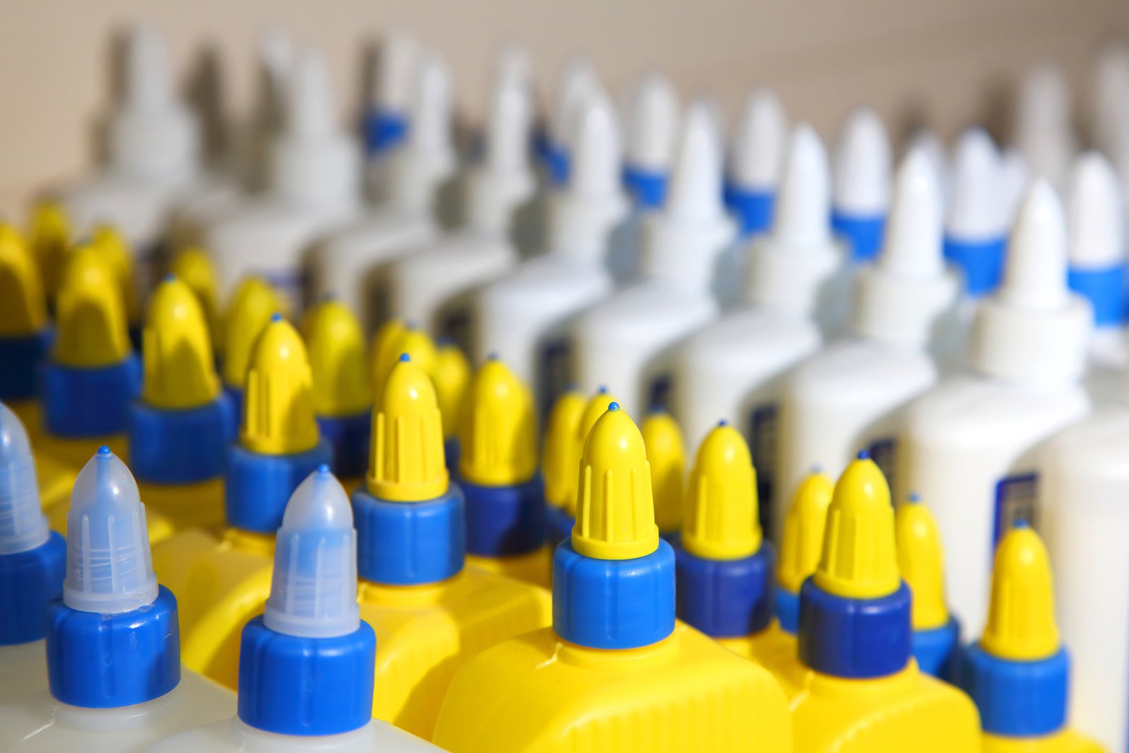 Stationery glue. School supplies, stationery accessories. Office glue. Colorful stationery. Goods for office and study.