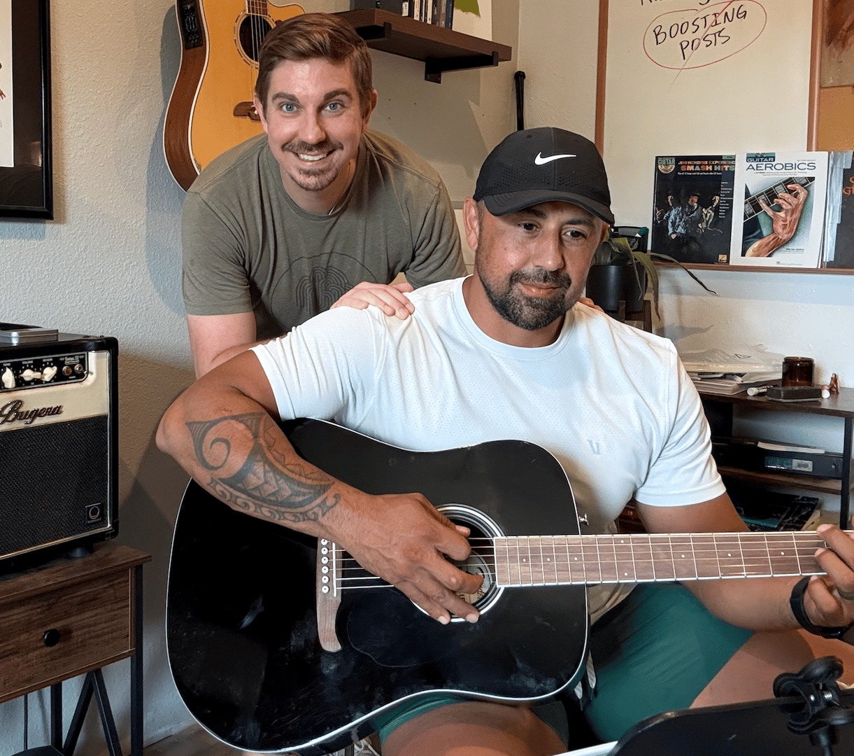 Teaching guitar student