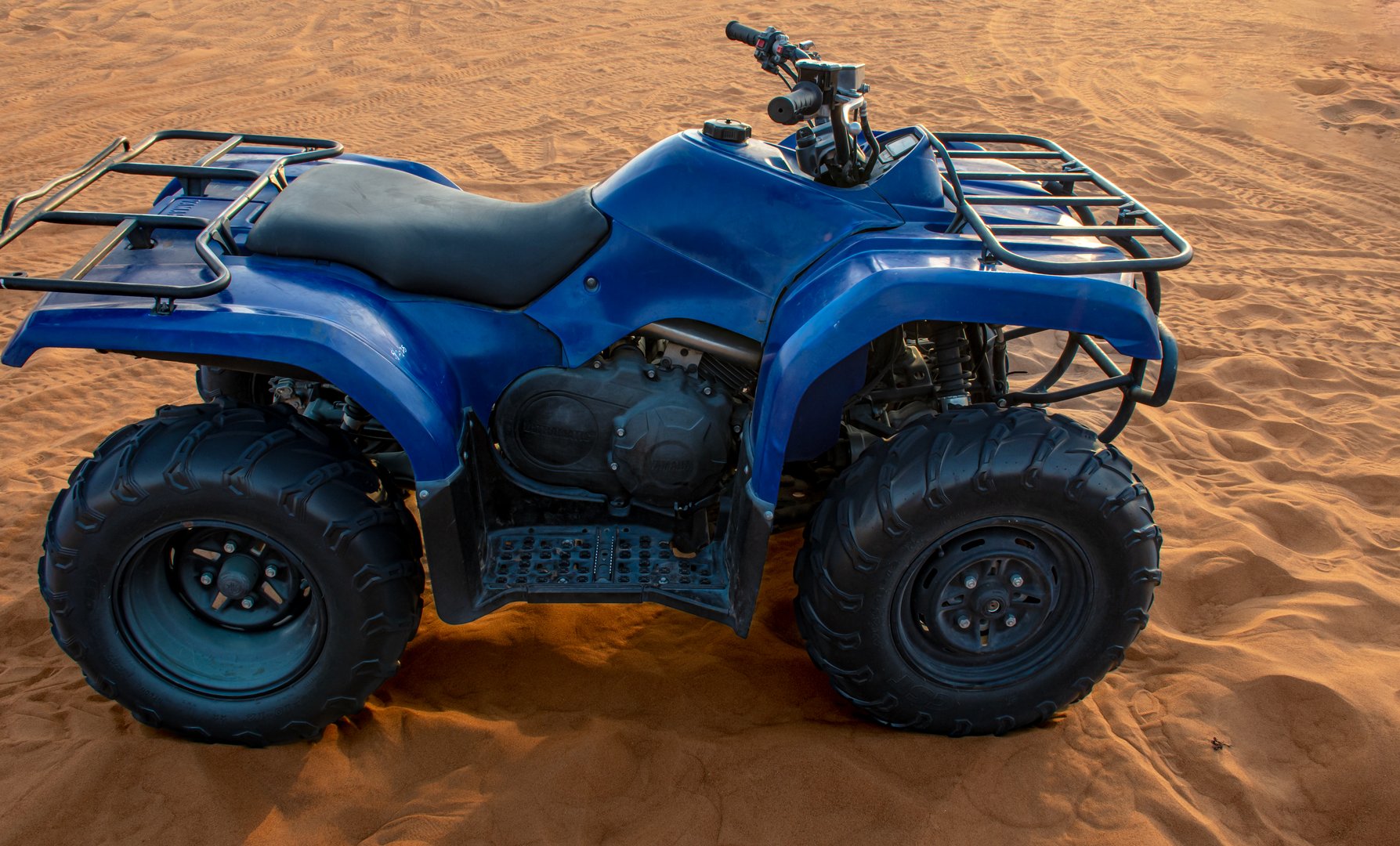 Side view of ATV Vehicle which is used for quad biking in desert safari at Dubai