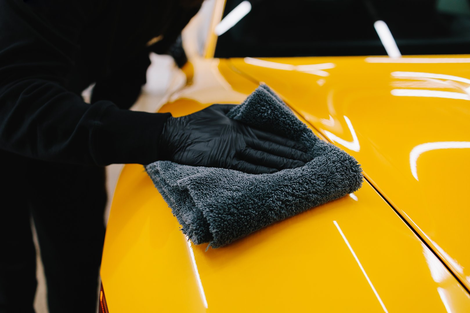 Car detailing with microfiber cloth
