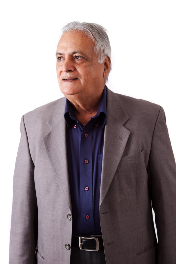 Portrait of a happy elderly East Indian businessman