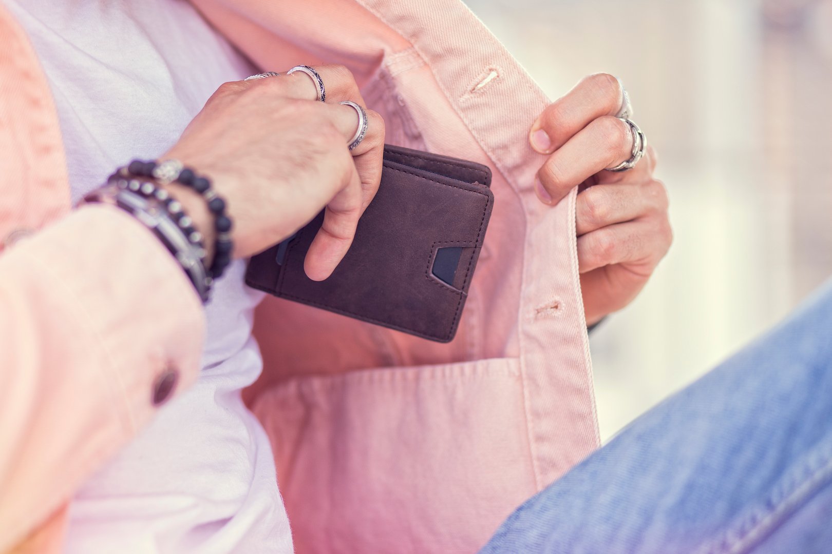 Close Up holding Leather Brown Wallet