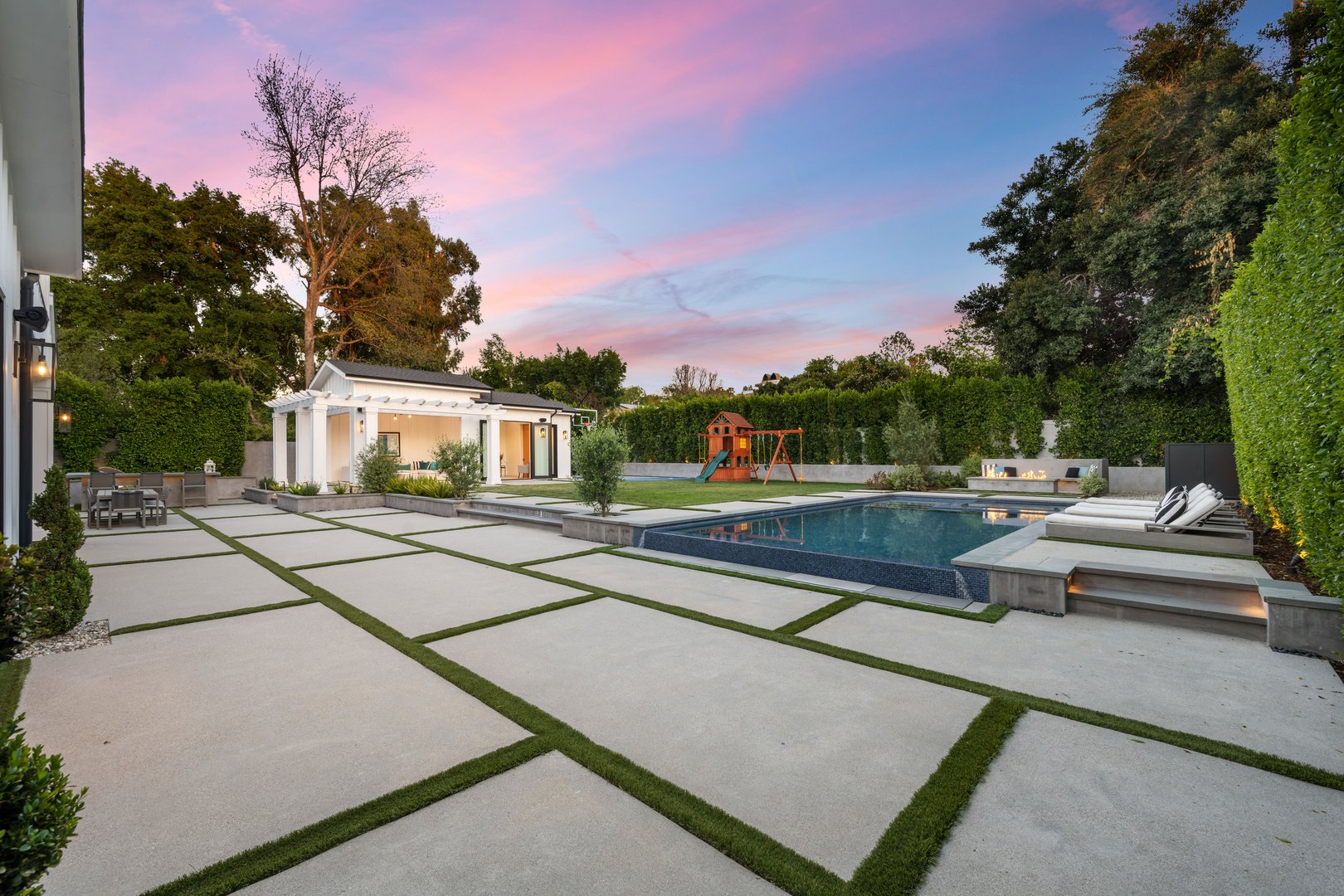 Concrete pavers, pool and landscaping