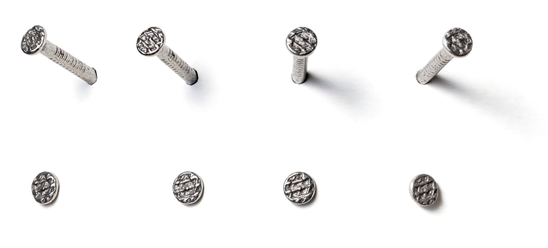 Shiny nail from different perspectives on a white background