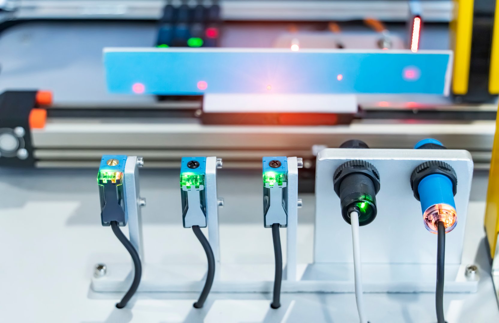 transducer on industrial machine robot in assembly line. Smart factory industry 4.0 concept.