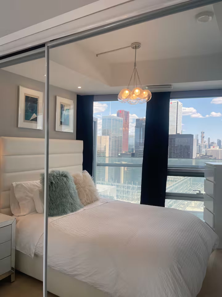 Comfortable bedroom with city views