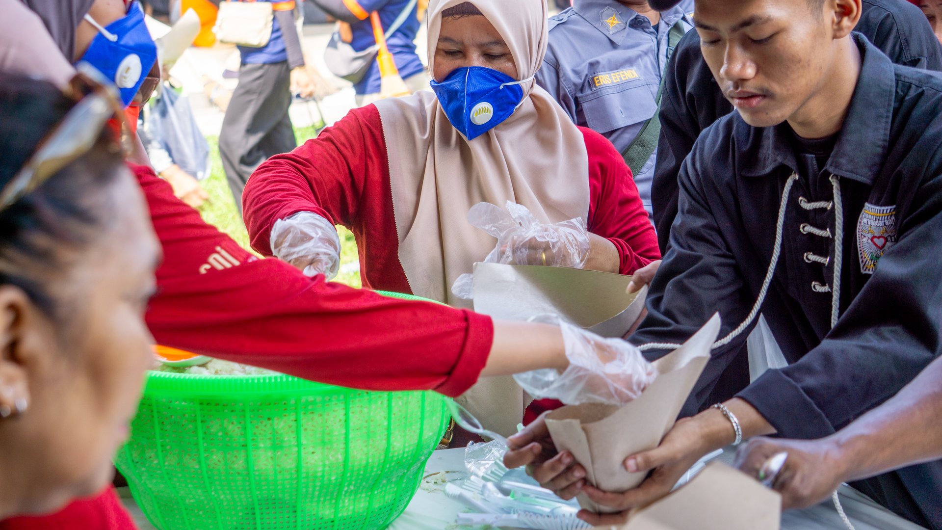 Kediri, East Java, Indonesia - September 5, 2025 : Sharing free food with fellow human beings. Food donations. Charity activities.