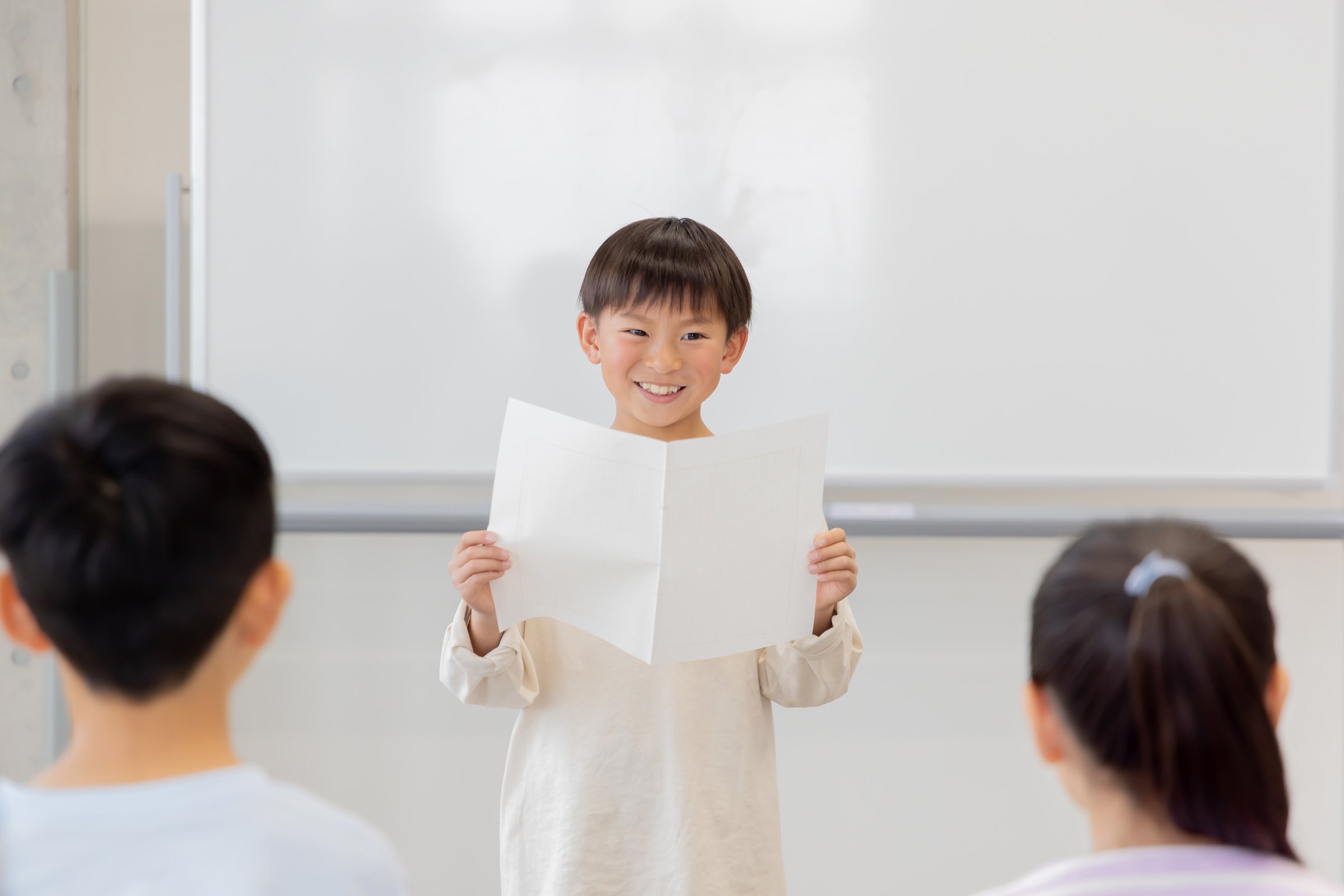 Elementary school students making a presentation in classroom