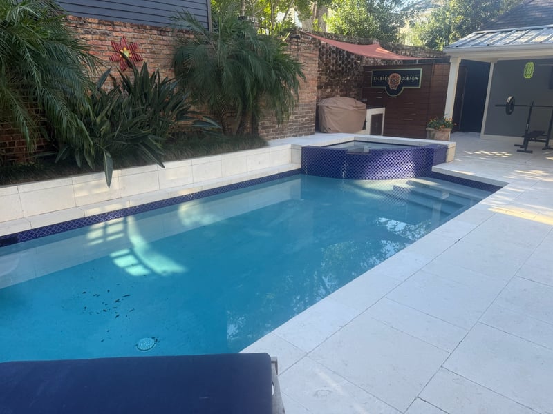 Modern swimming pool construction Louisiana - private villa pool with lounge area