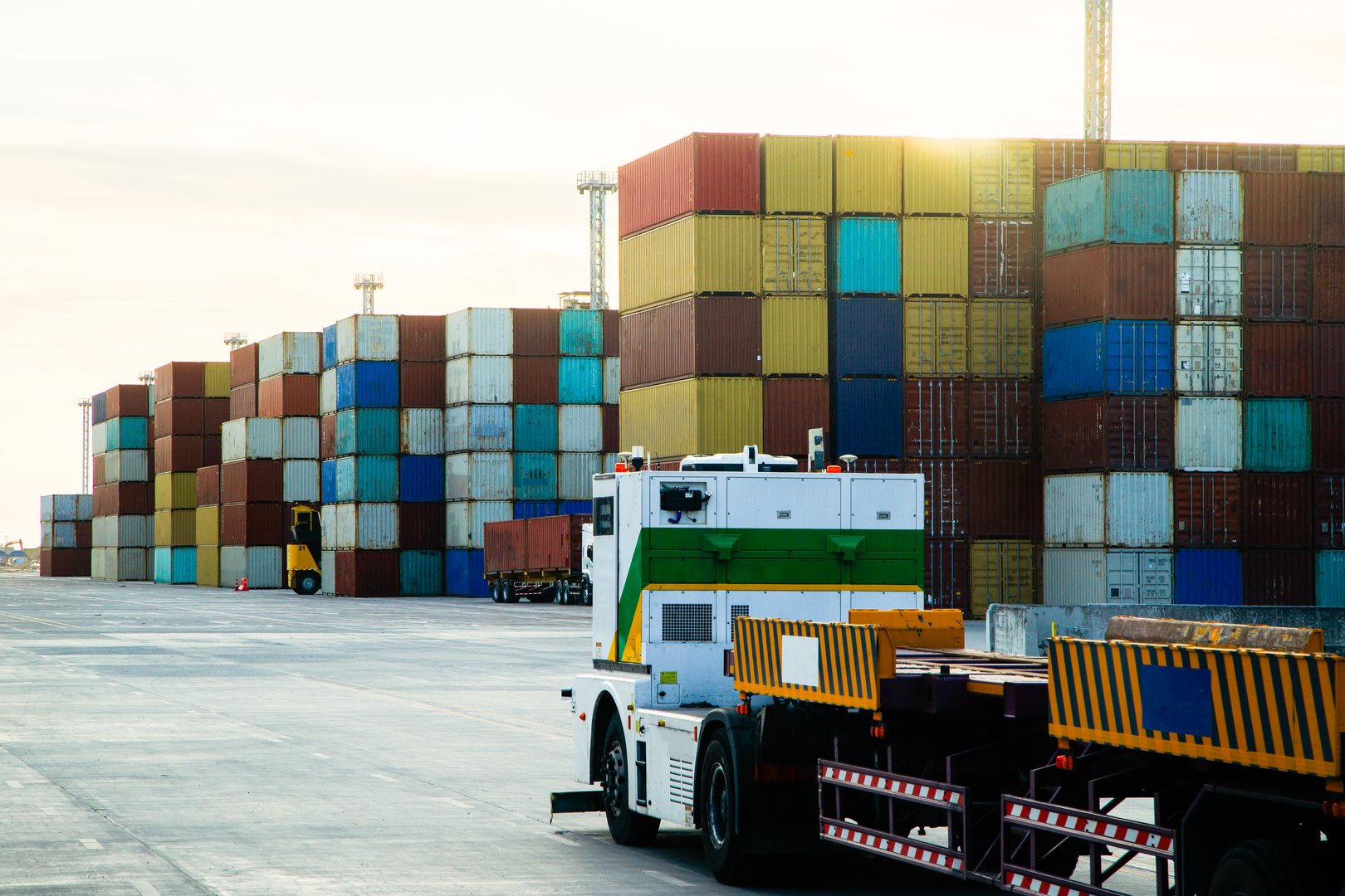 Industrial Container Cargo freight ship, forklift handling container box loading for logistic import export and transport industry concept