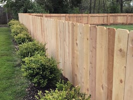 Custom fence installation by Reed Enterprise
