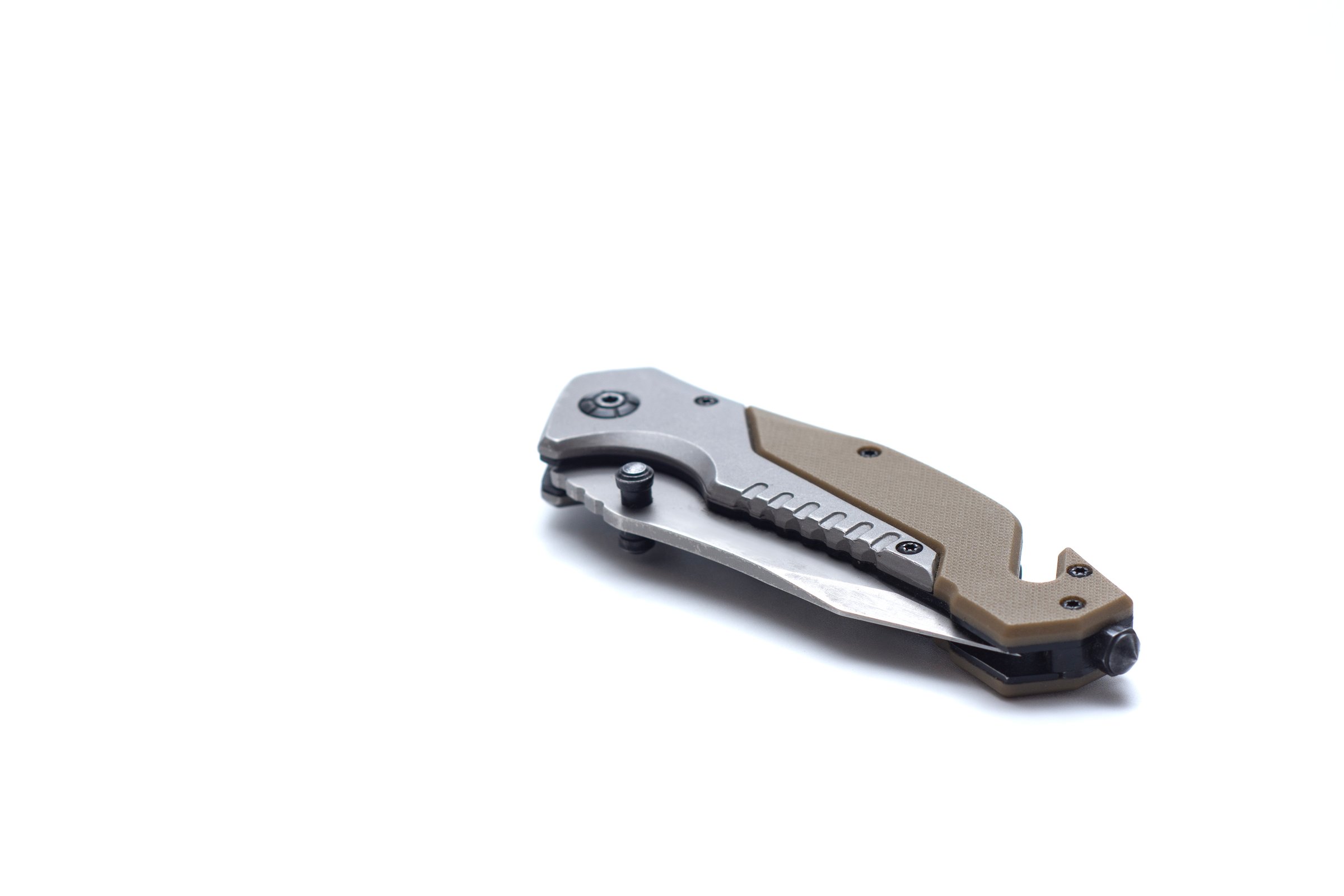 Tactical folding knife with its durable blade and compact design. Reliable tool for camping, hiking, and survival tasks