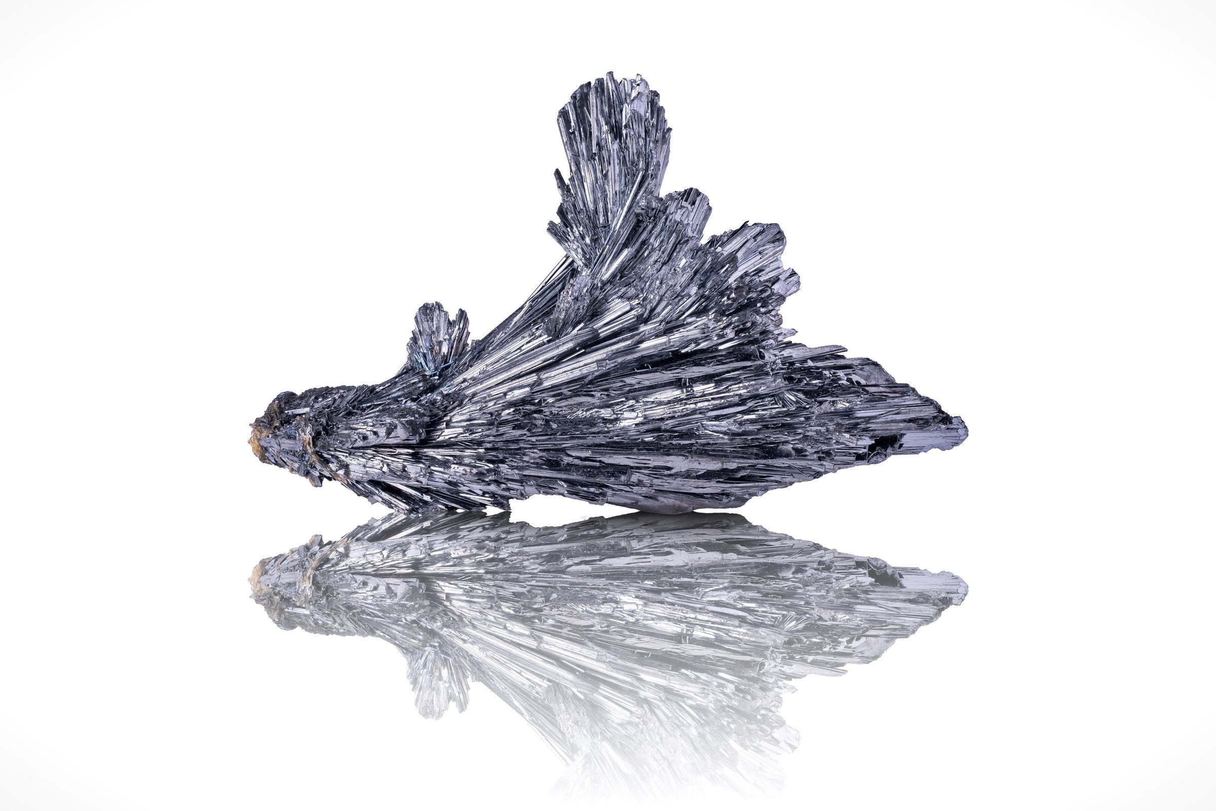 Stibnite photography isolated on white blackground. Specimen from Herja Mine, Chiuzbaia, Baia Mare, Maramureș Romania. macro detail  background. close-up mineral crystal unpolished